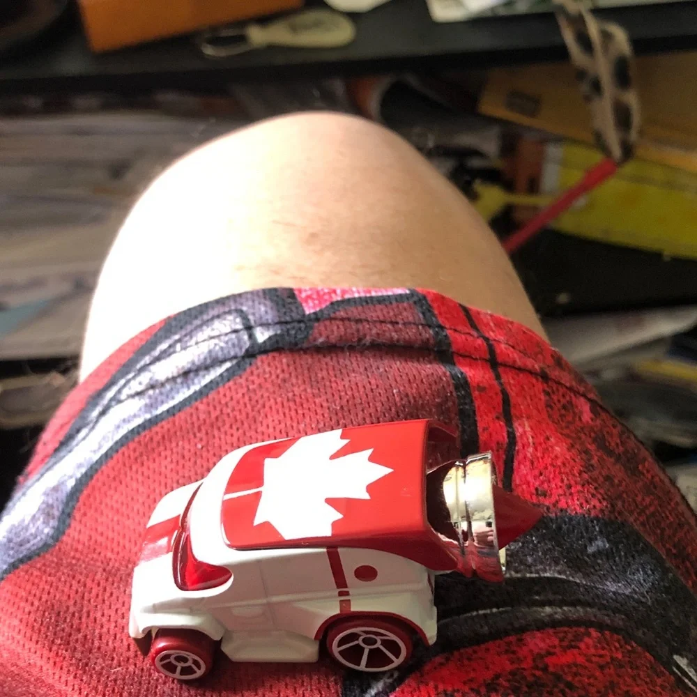 Red & White Maple Leaf Toy Car